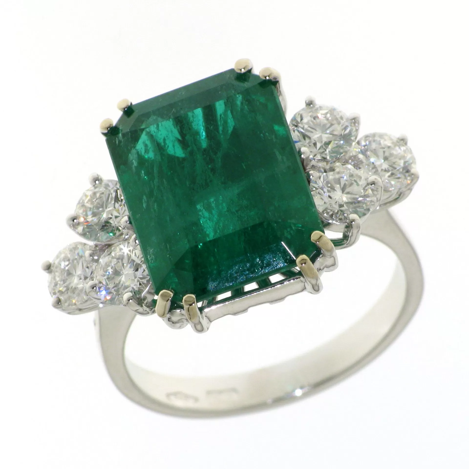 Ring with Diamonds and octagon Emerald